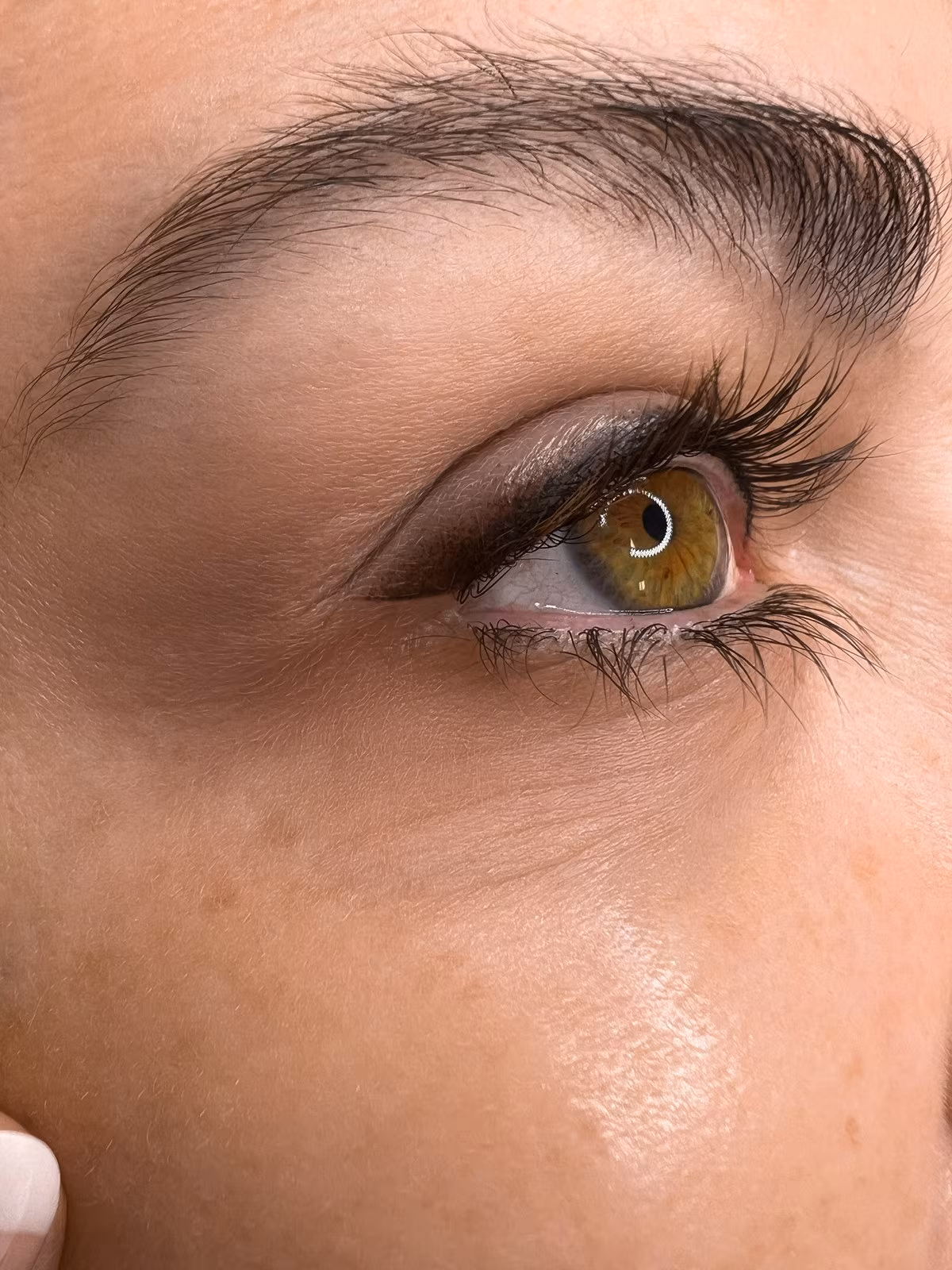 Foxyline tattoo, permanent eyeliner with an elongated wing and soft eyeshadow effect at the outer corner