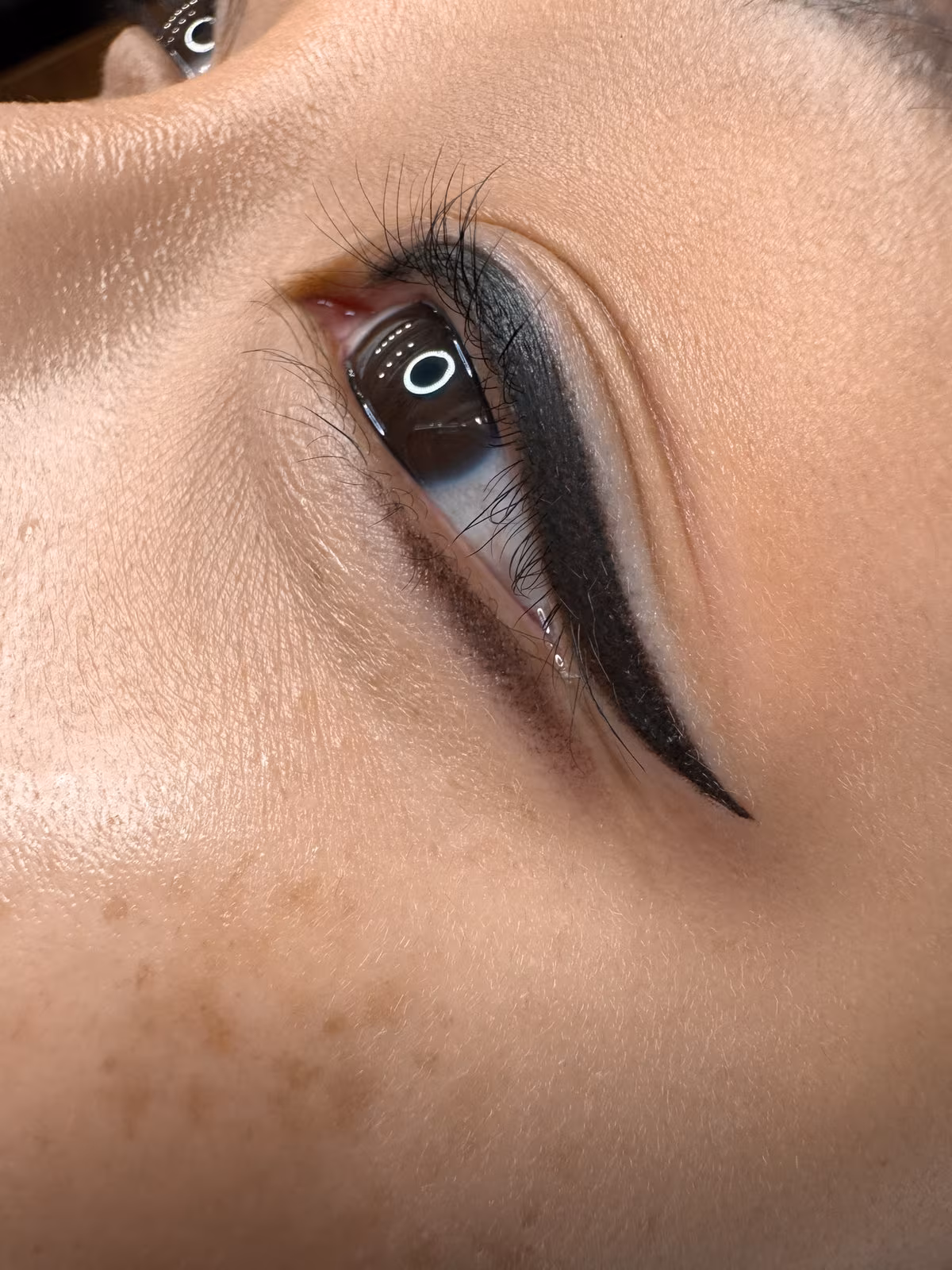 Bold winged eyeliner tattoo with lower eyeliner, permanent eyeliner by Yulia Alpeza Bellevue WA