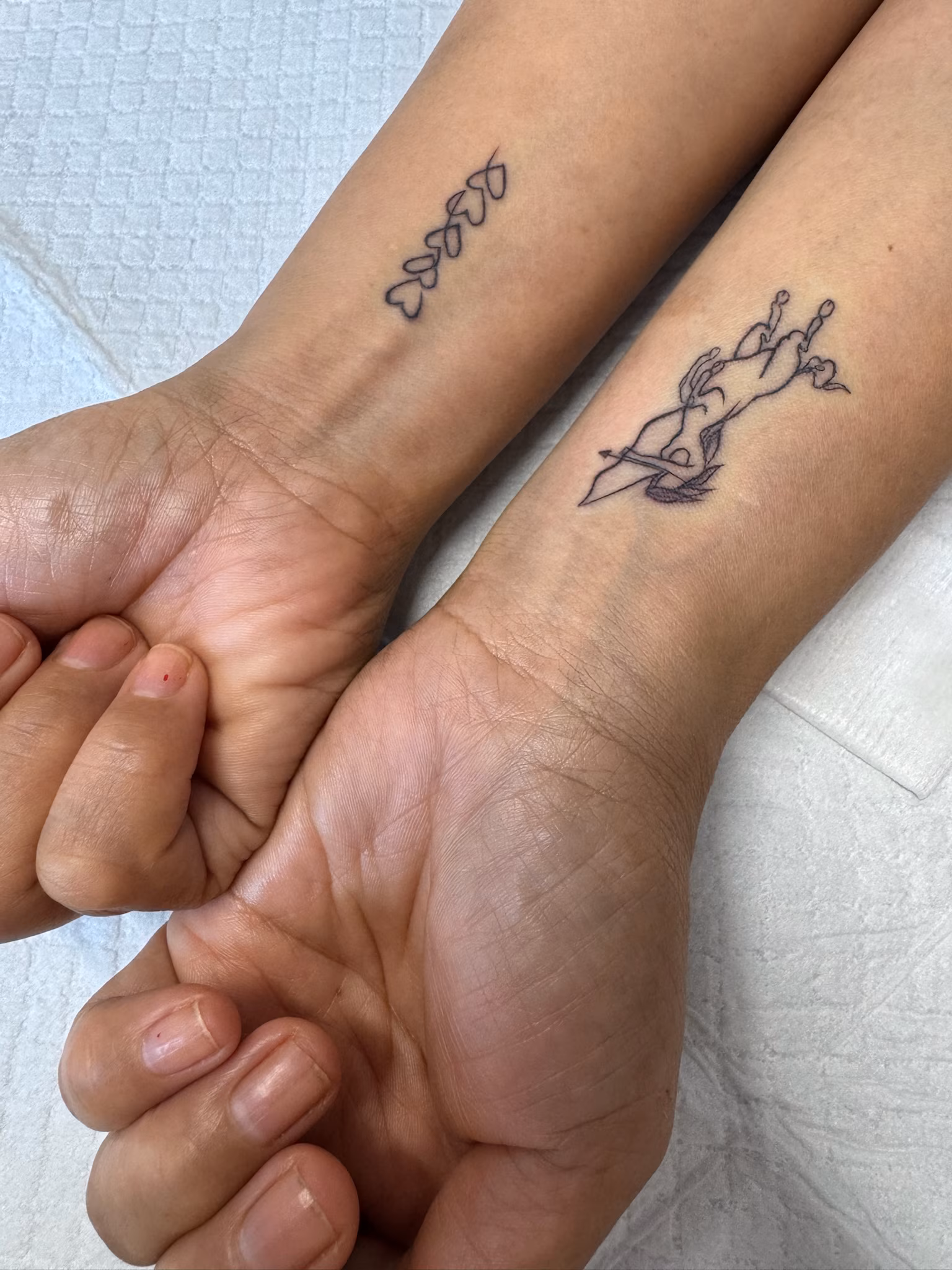 Fine-line tattoo by Daria Lamt at Calypso Beauty, Kirkland