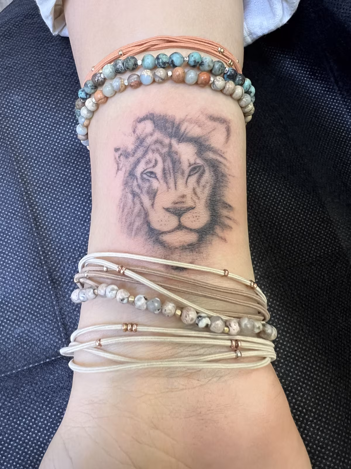 Nature-inspired fine-line tattoo design by Daria at Calypso Beauty