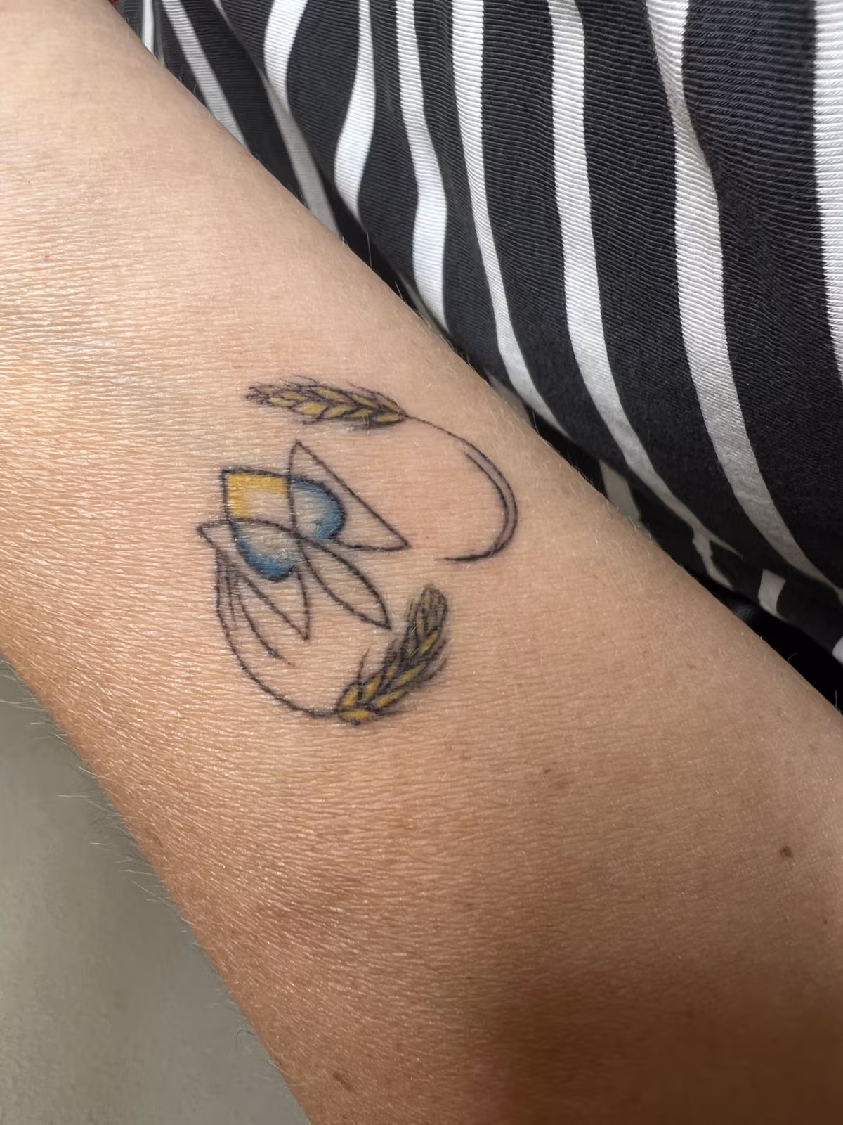 Fine-line tattoo example, delicate single-needle linework