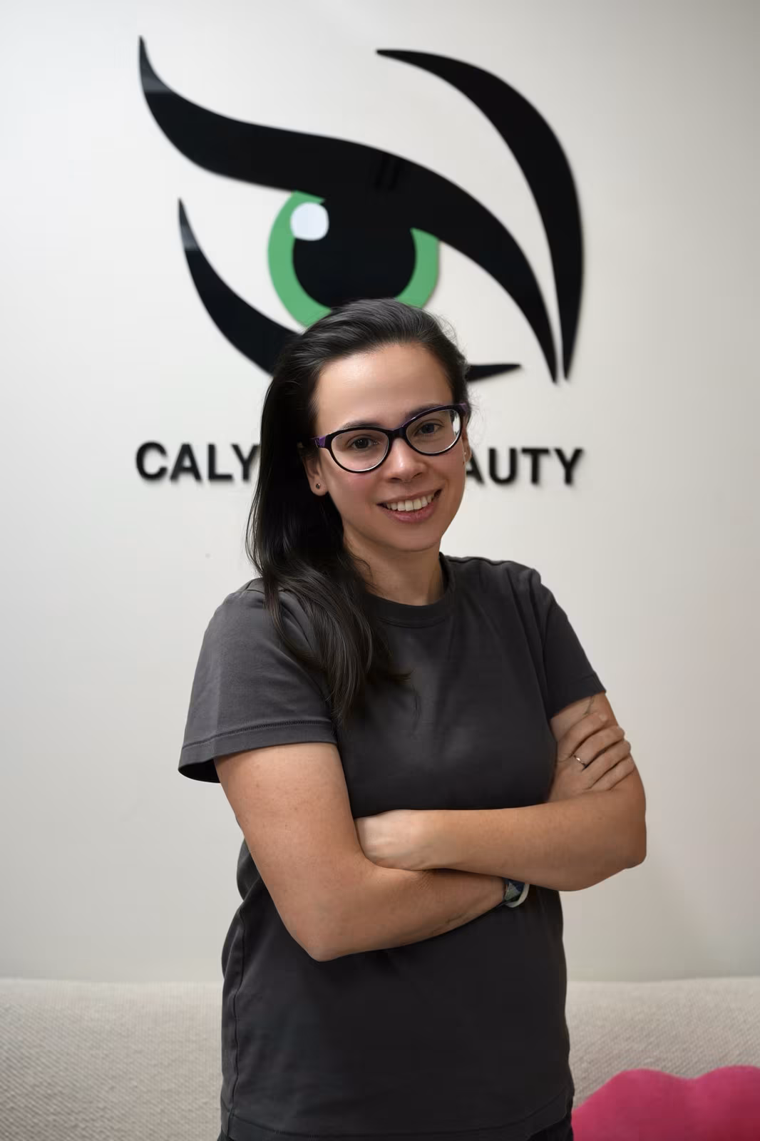 Portrait of Daria, fine-line tattoo artist at Calypso Beauty